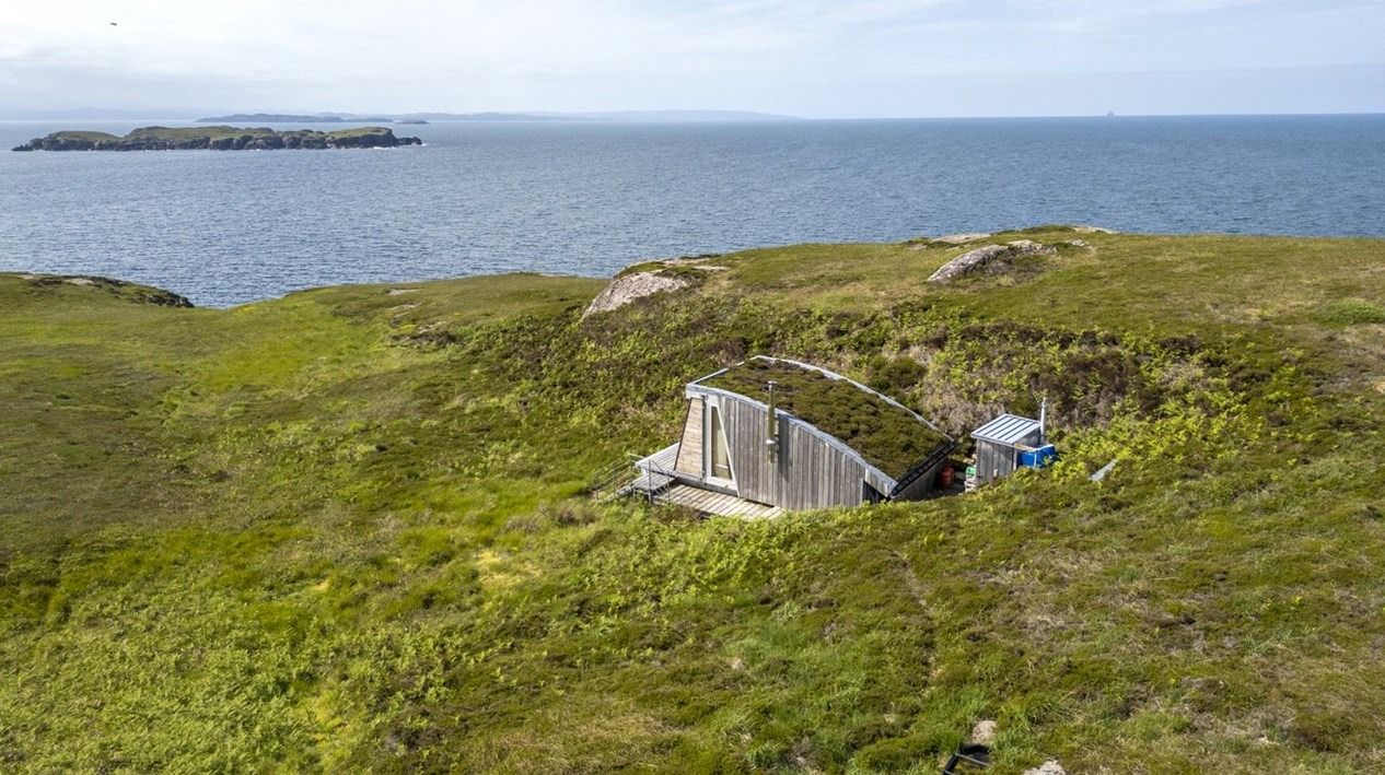 Image may contain Nature Outdoors Scenery Sea Water Shoreline Land Architecture Building Shelter and Coast