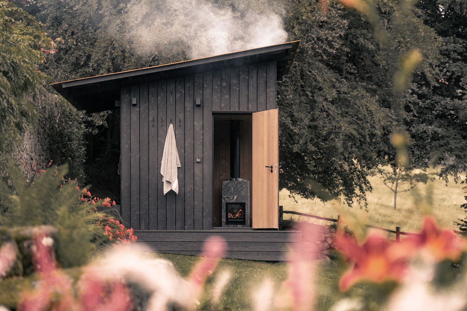 Image may contain Architecture Building Housing Outdoors Countryside Hut Nature Rural House Cabin and Person