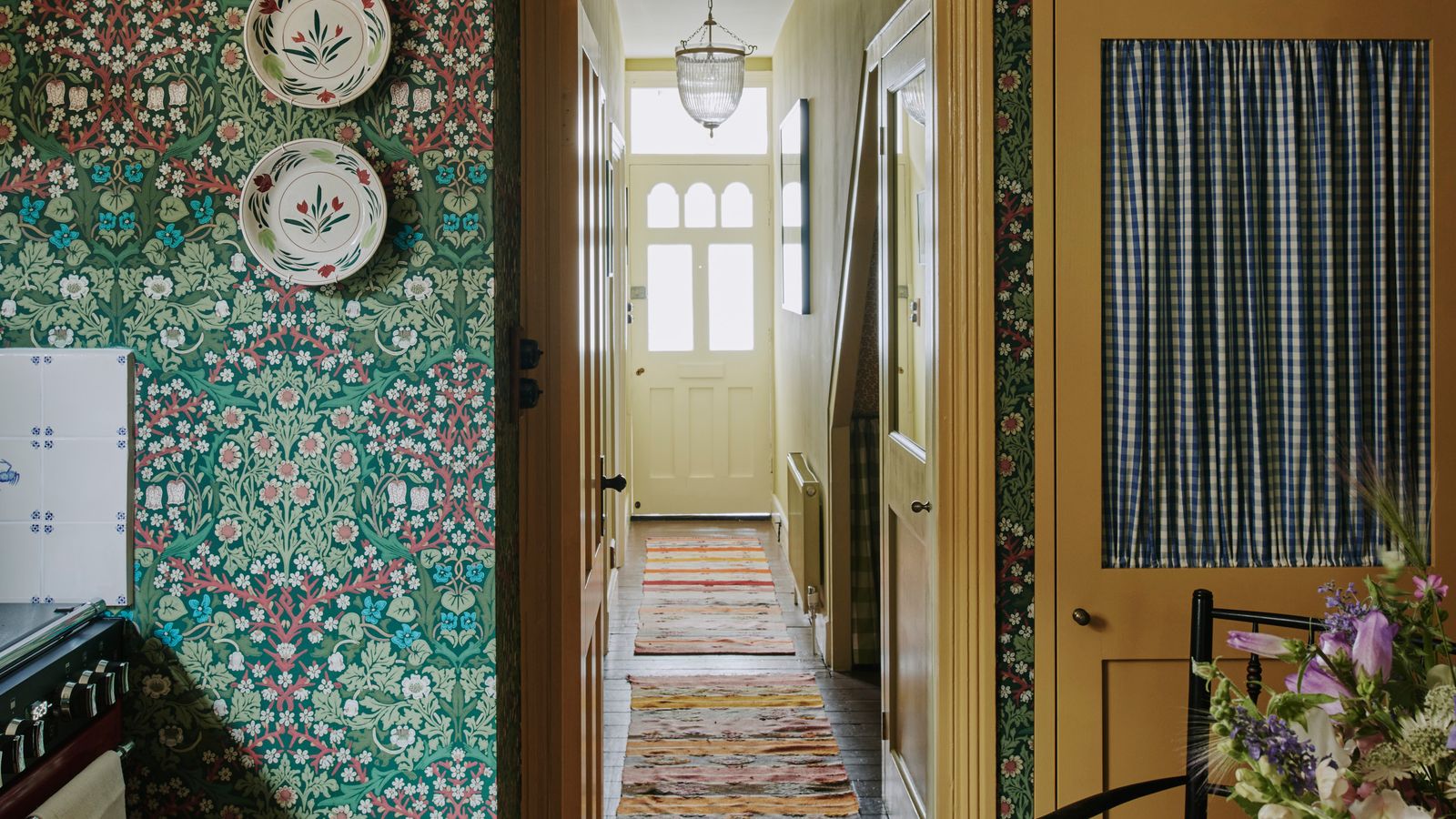 Image may contain: Indoors, Interior Design, Lamp, Cup, Desk, Furniture, Table, Plate, Chair, Art, Painting, and Architecture