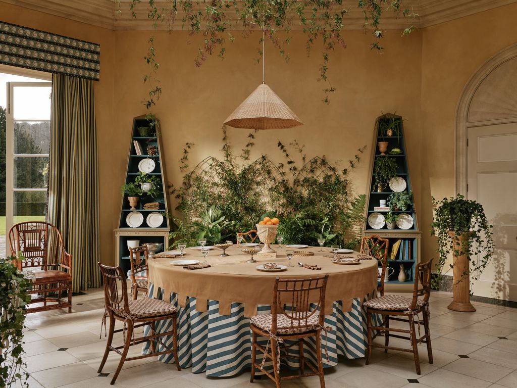 Image may contain Architecture Building Dining Room Dining Table Furniture Indoors Room Table Chair and Home Decor