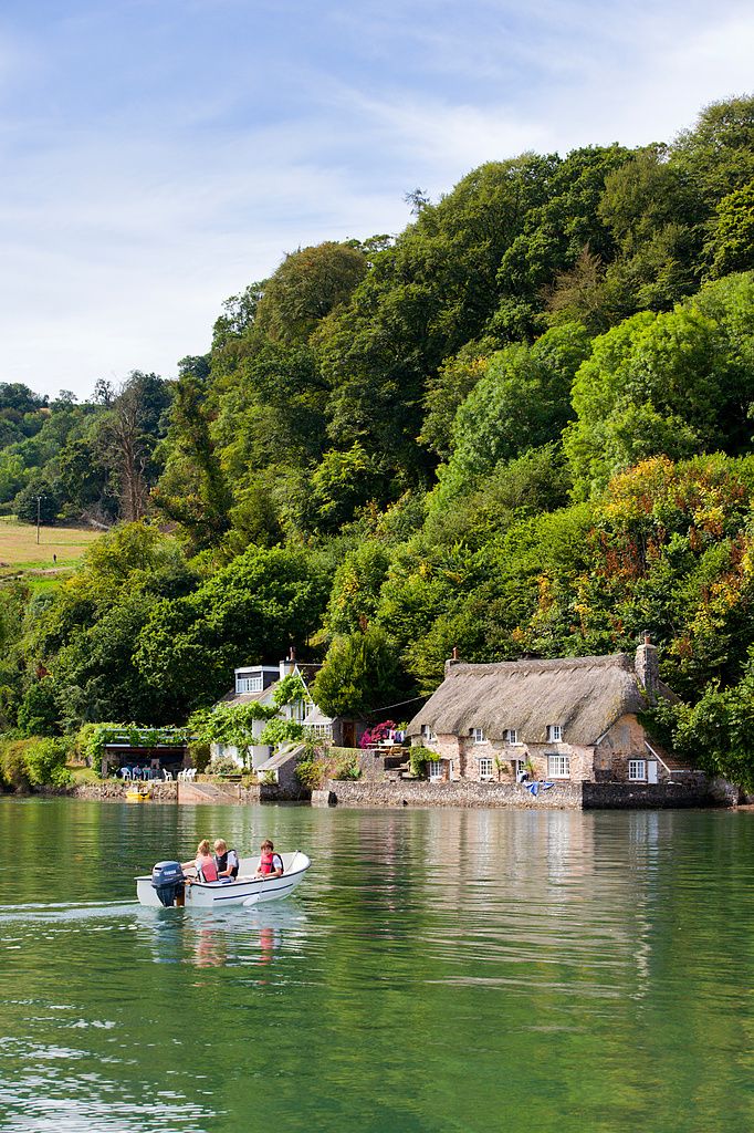 Image may contain Boat Transportation Vehicle Nature Outdoors Scenery Person Architecture Building and Countryside