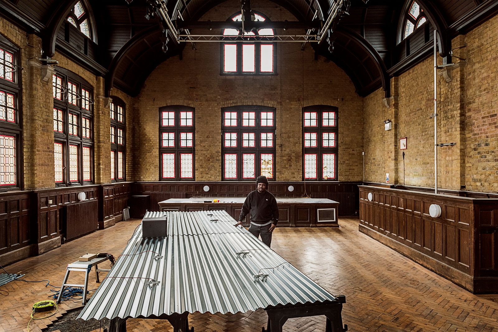 Image may contain Person Indoors Interior Design Clothing and Hat