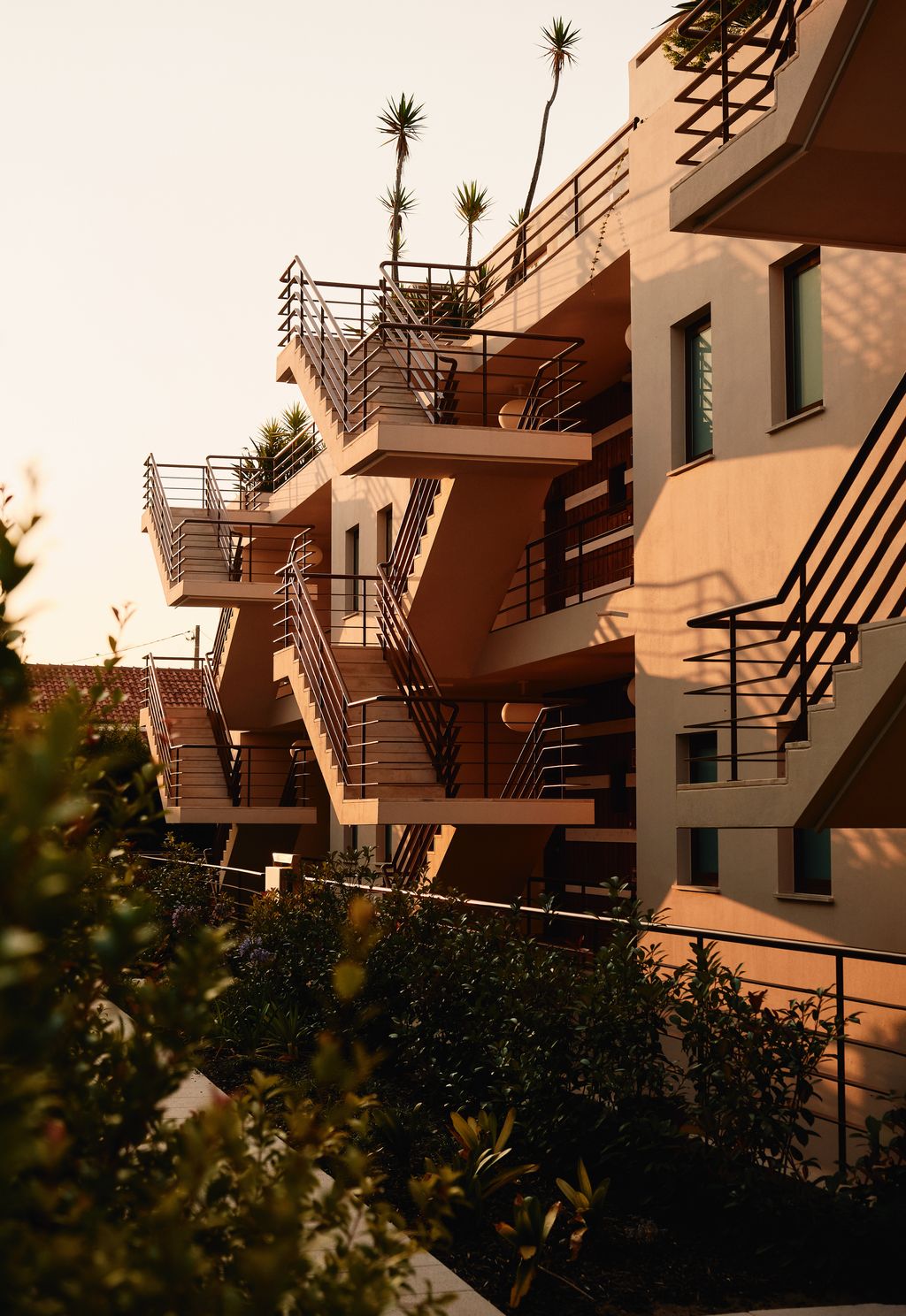 Image may contain City Architecture Building Condo Housing Apartment Building High Rise Urban House and Staircase