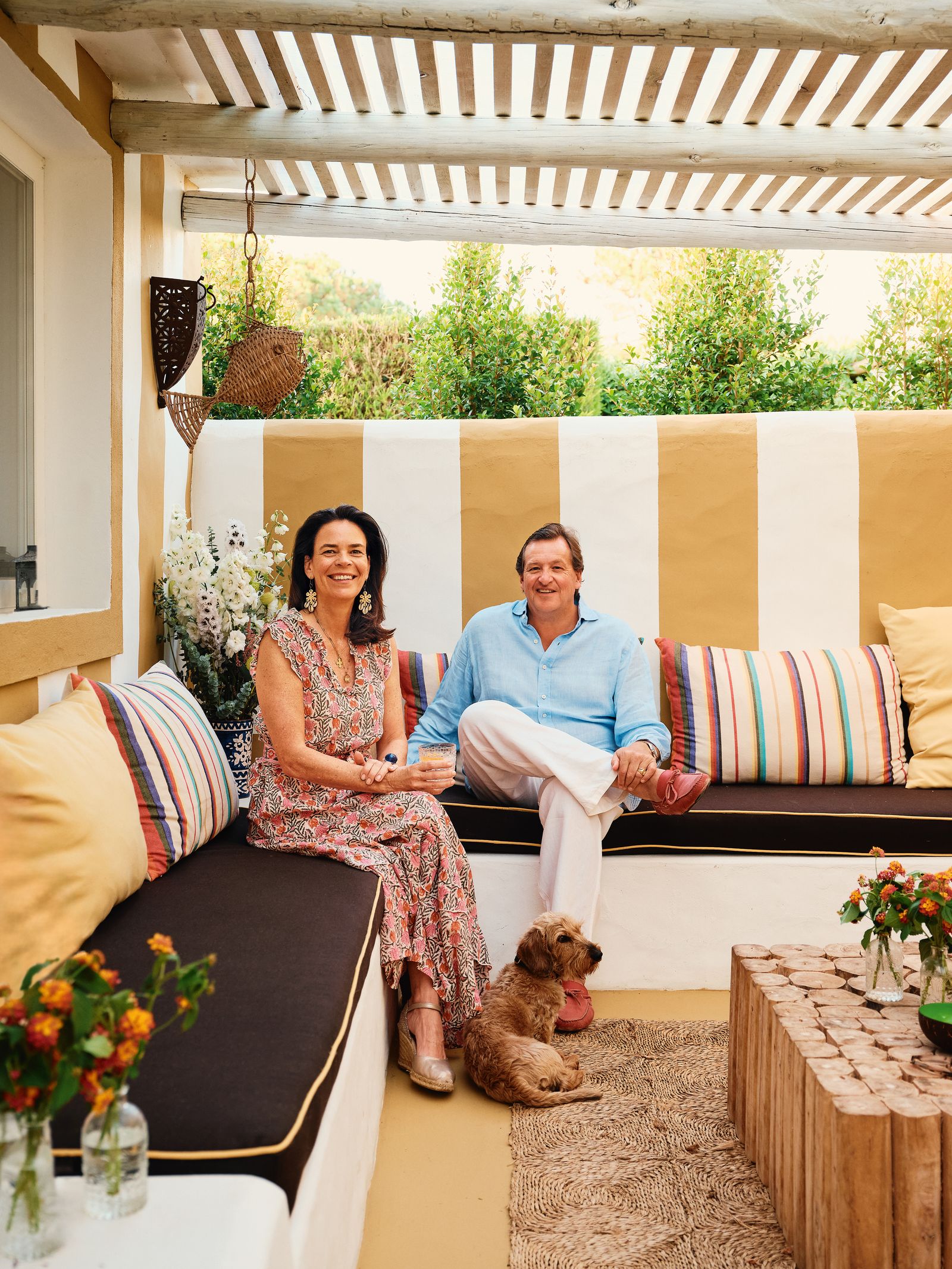 Image may contain Plant Potted Plant Cushion Home Decor Couch Furniture People Person Adult and Architecture