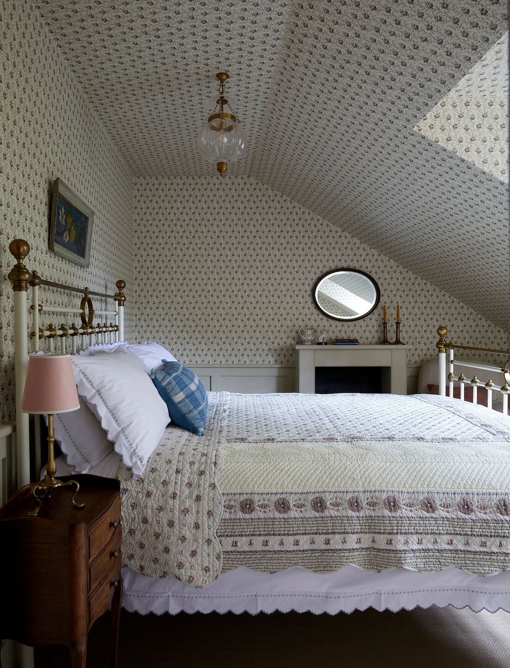 Image may contain Indoors Interior Design Lamp Desk Furniture Table Bed Art Painting Table Lamp and Home Decor