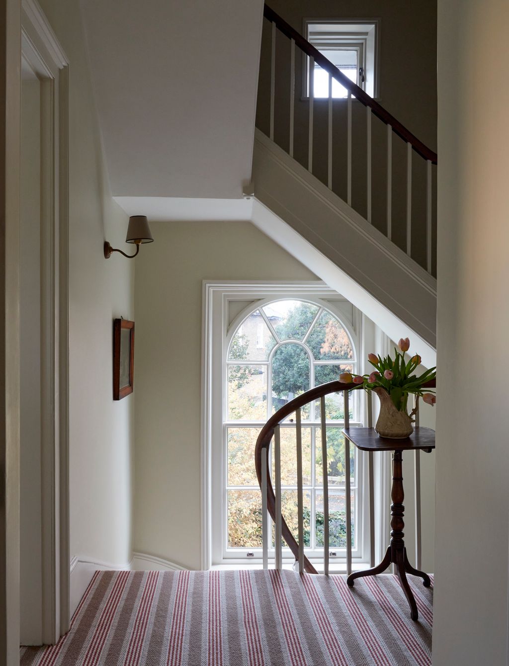 Image may contain Lamp Architecture Building Foyer Indoors Art and Painting