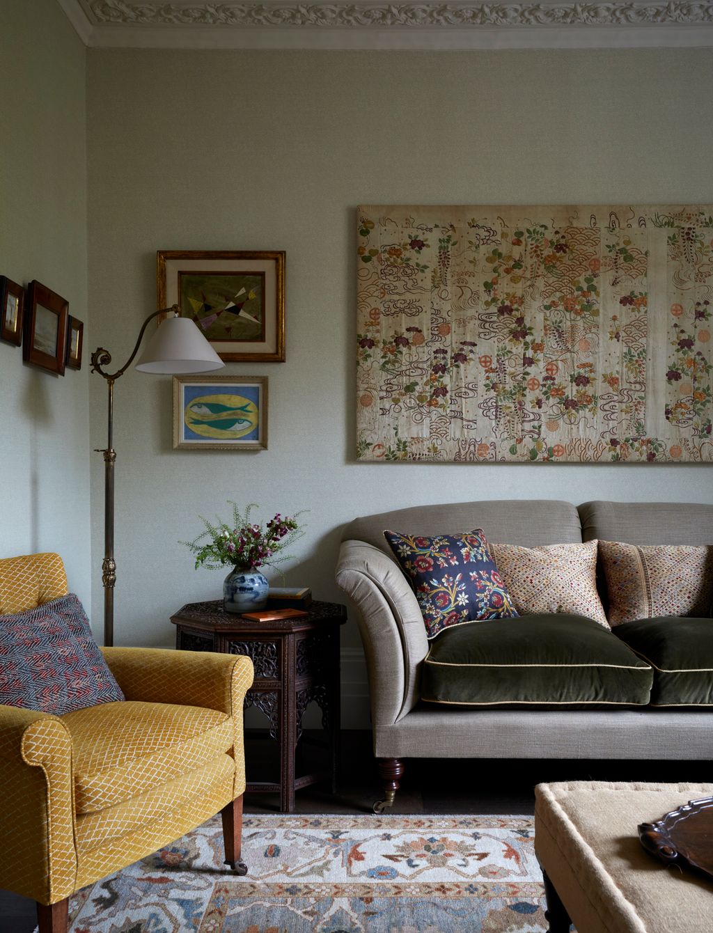 Image may contain Architecture Building Furniture Indoors Living Room Room Home Decor Couch Lamp Art and Painting