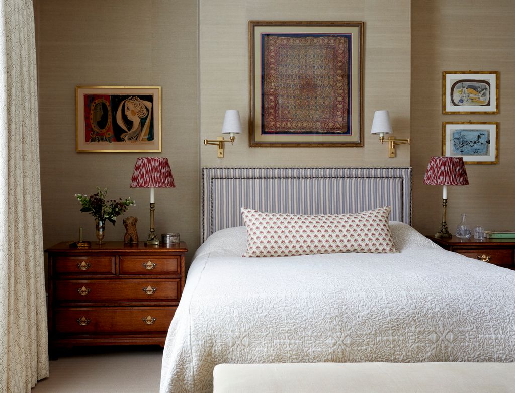 Image may contain Lamp Home Decor Cushion Bed Furniture Art Painting Table Lamp Indoors Interior Design and Person