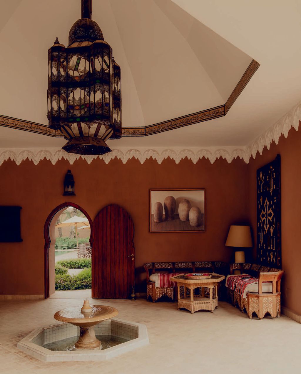 Image may contain Lamp Indoors Interior Design Chandelier Home Decor Architecture Building Furniture and Living Room