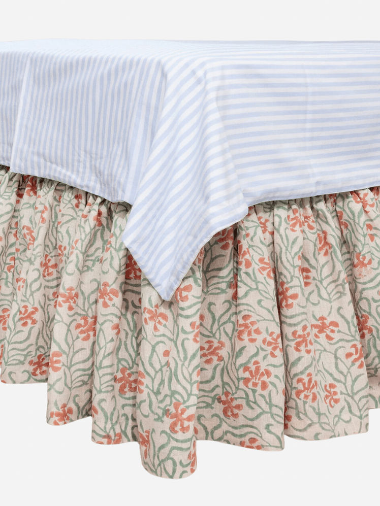 Image may contain: Tablecloth, Furniture, Blouse, and Clothing