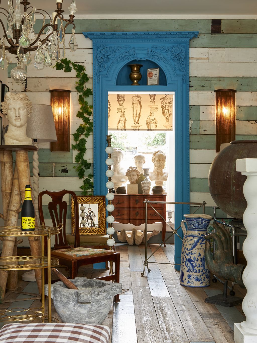 Image may contain Praxiteles Lamp Indoors Interior Design Chair Furniture Person Desk Table and Architecture