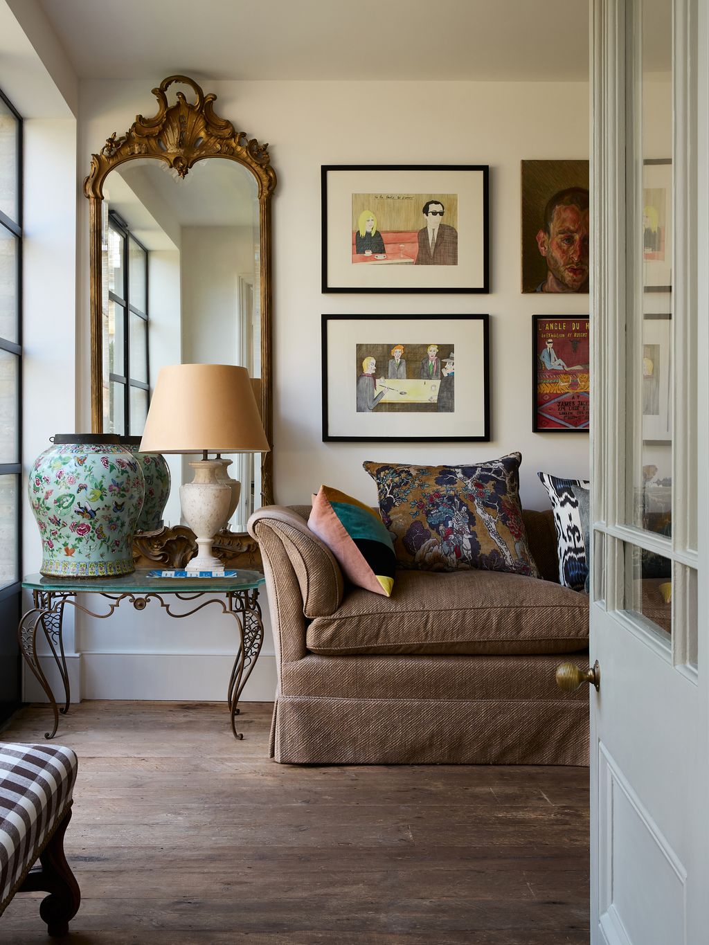 Image may contain Lamp Couch Furniture Architecture Building Indoors Living Room Room Home Decor Art and Painting