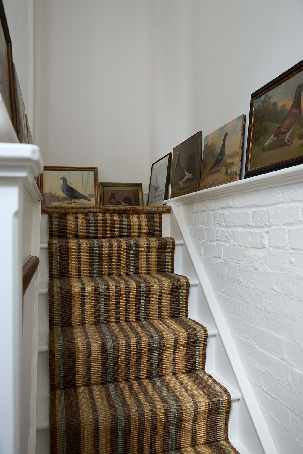 Image may contain Architecture Building House Housing Staircase Art Painting Animal Bird and Indoors