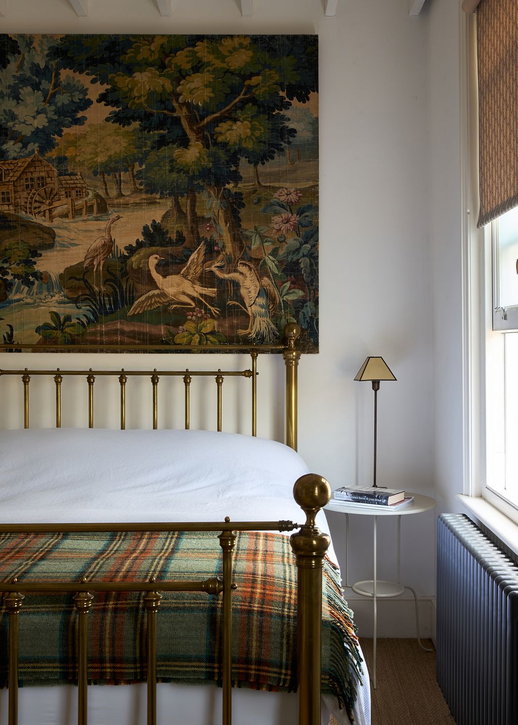 Image may contain Lamp Indoors Interior Design Bed Furniture Desk Table Home Decor Bedroom Room and Book