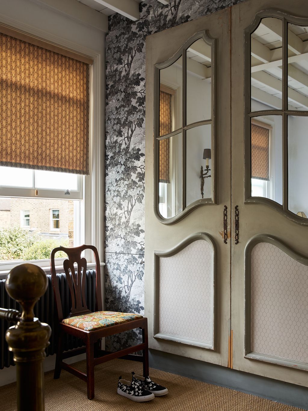 Image may contain Door Indoors Interior Design Chair Furniture Architecture Building Housing Clothing and Footwear