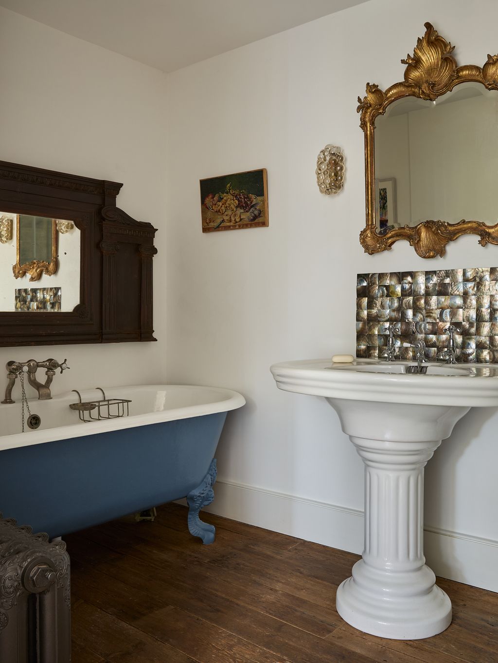 Image may contain Indoors Interior Design Bathing Sink Sink Faucet Bathtub Person Tub Art and Painting