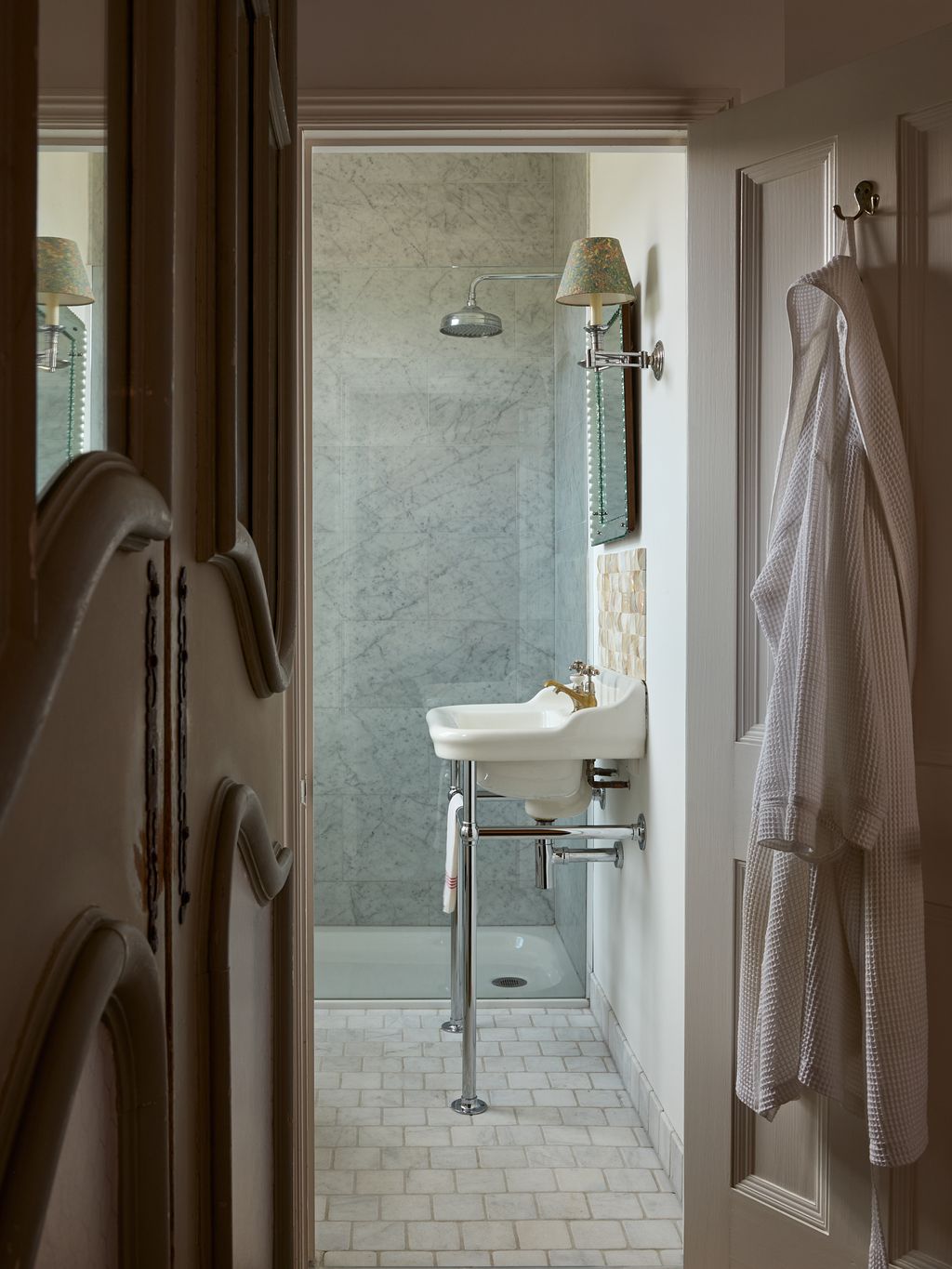 Image may contain Indoors Sink Sink Faucet Lamp and Interior Design