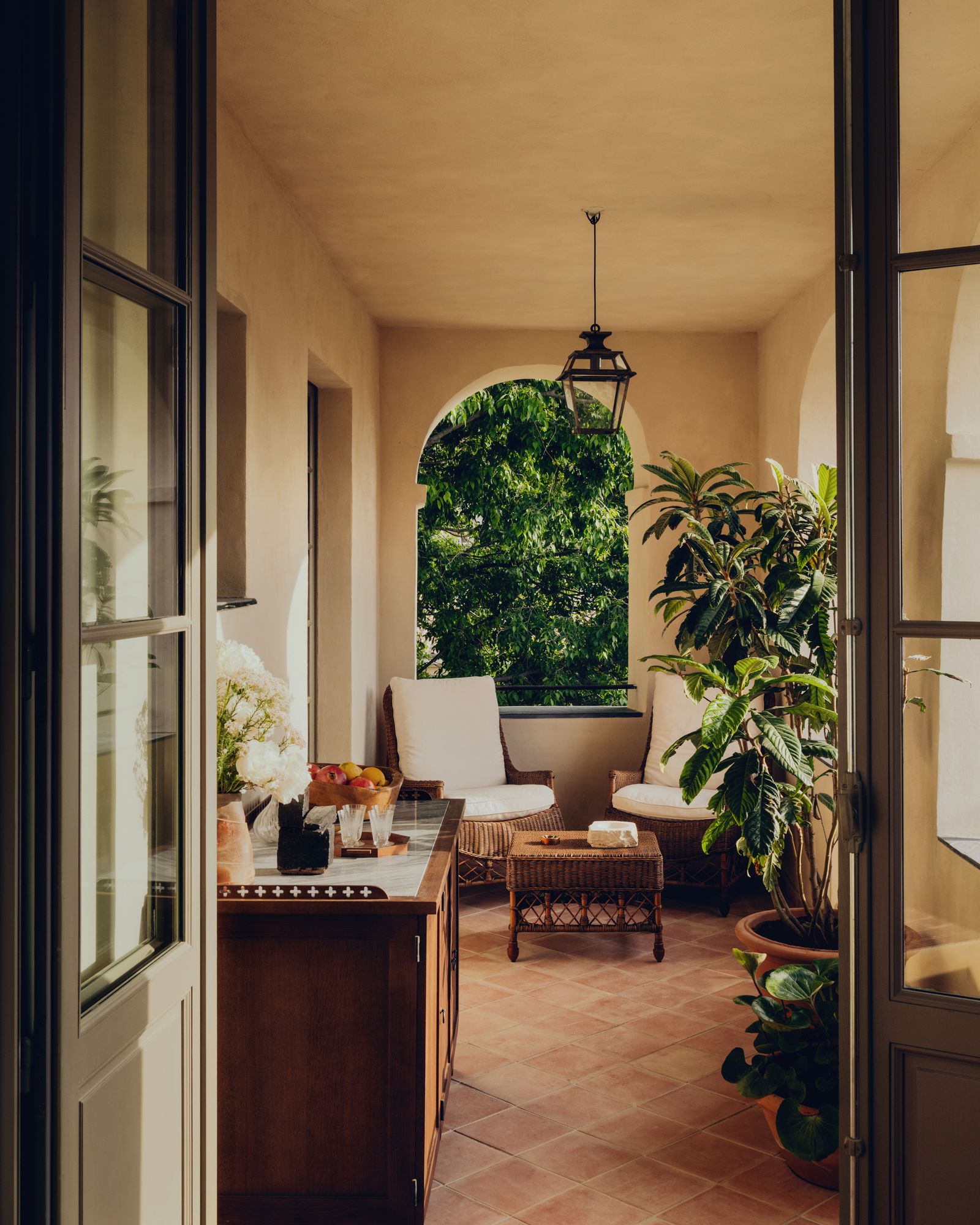 Image may contain Lamp Plant Chair Furniture Floor Indoors Interior Design and Window