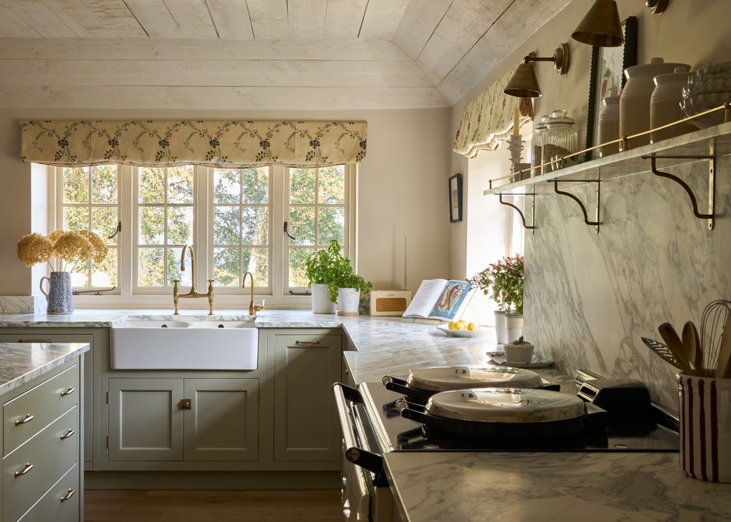 Image may contain Indoors Interior Design Book Publication Kitchen Sink Lamp Sink Faucet Home Decor and Window