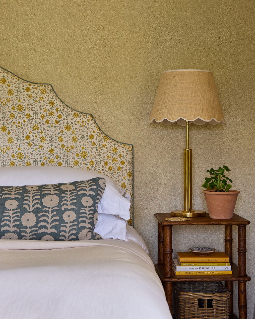 Image may contain Lamp Plant Book Publication Bed Furniture Table Lamp Plate Cushion and Home Decor