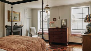 Image may contain Lamp Furniture Bed Bedroom Indoors Room Chair Home Decor Rug Art Painting and Plate