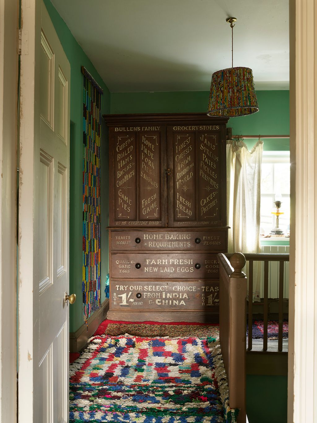 Image may contain Lamp Home Decor Indoors Interior Design Rug Architecture Building and Foyer