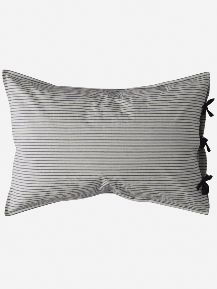 Image may contain: Cushion, Home Decor, Pillow, Accessories, Bag, and Handbag