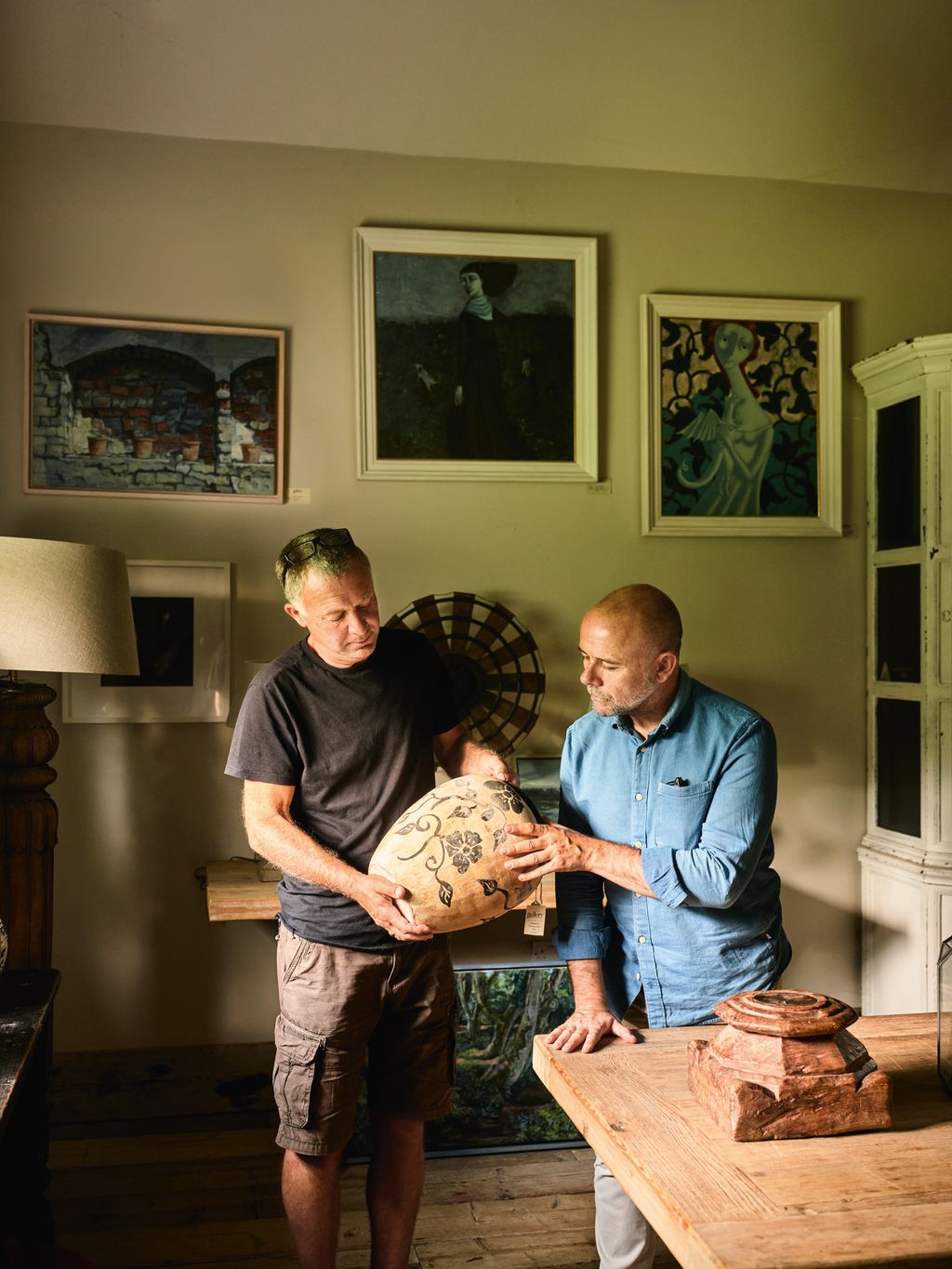Image may contain Face Head Person Photography Portrait Architecture Building Dining Room and Dining Table