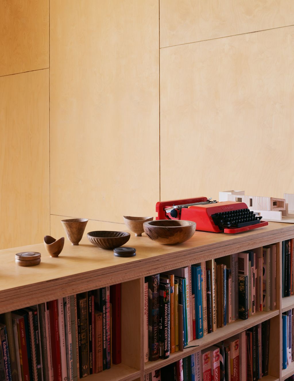 Image may contain Furniture Plywood Wood Shelf Bookcase Indoors Interior Design and Table