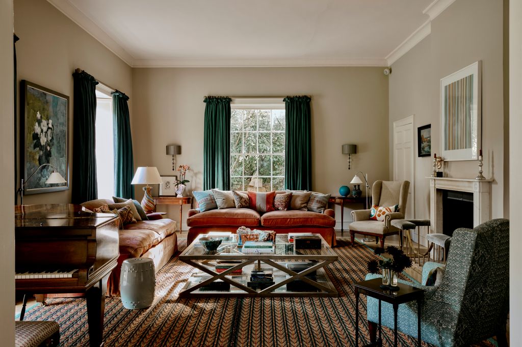 Image may contain Home Decor Architecture Building Furniture Indoors Living Room Room Table and Keyboard