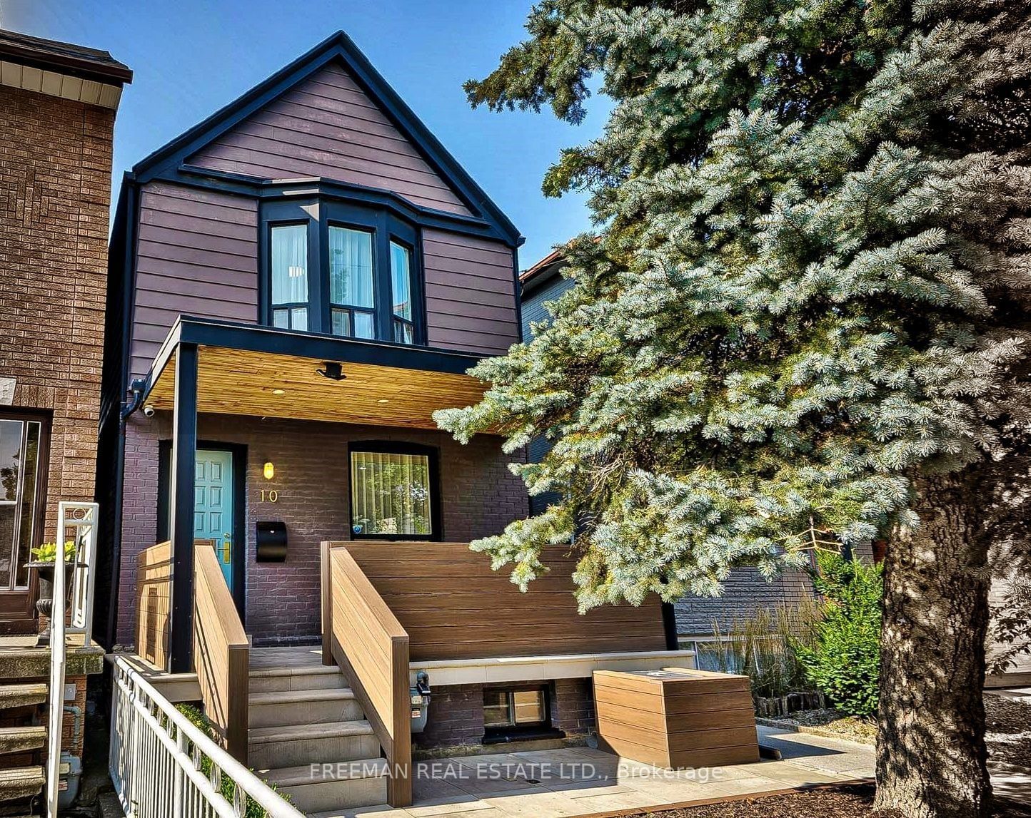 Image may contain Indoors Interior Design Architecture Building Housing House Wood Person Suburb and Portico