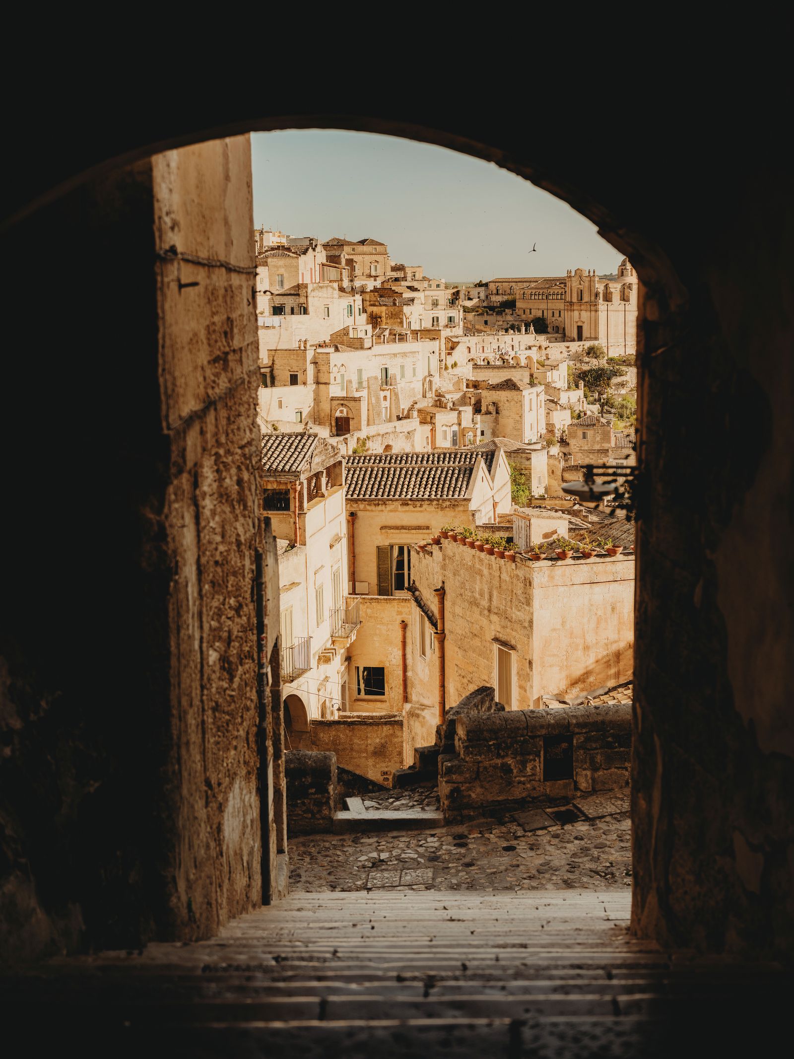 Image may contain City Road Street Urban Architecture Building Cityscape Alley Nature Outdoors and Countryside