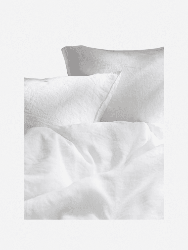 Image may contain: Cushion, Home Decor, Pillow, Bed, Furniture, Linen, and Blanket