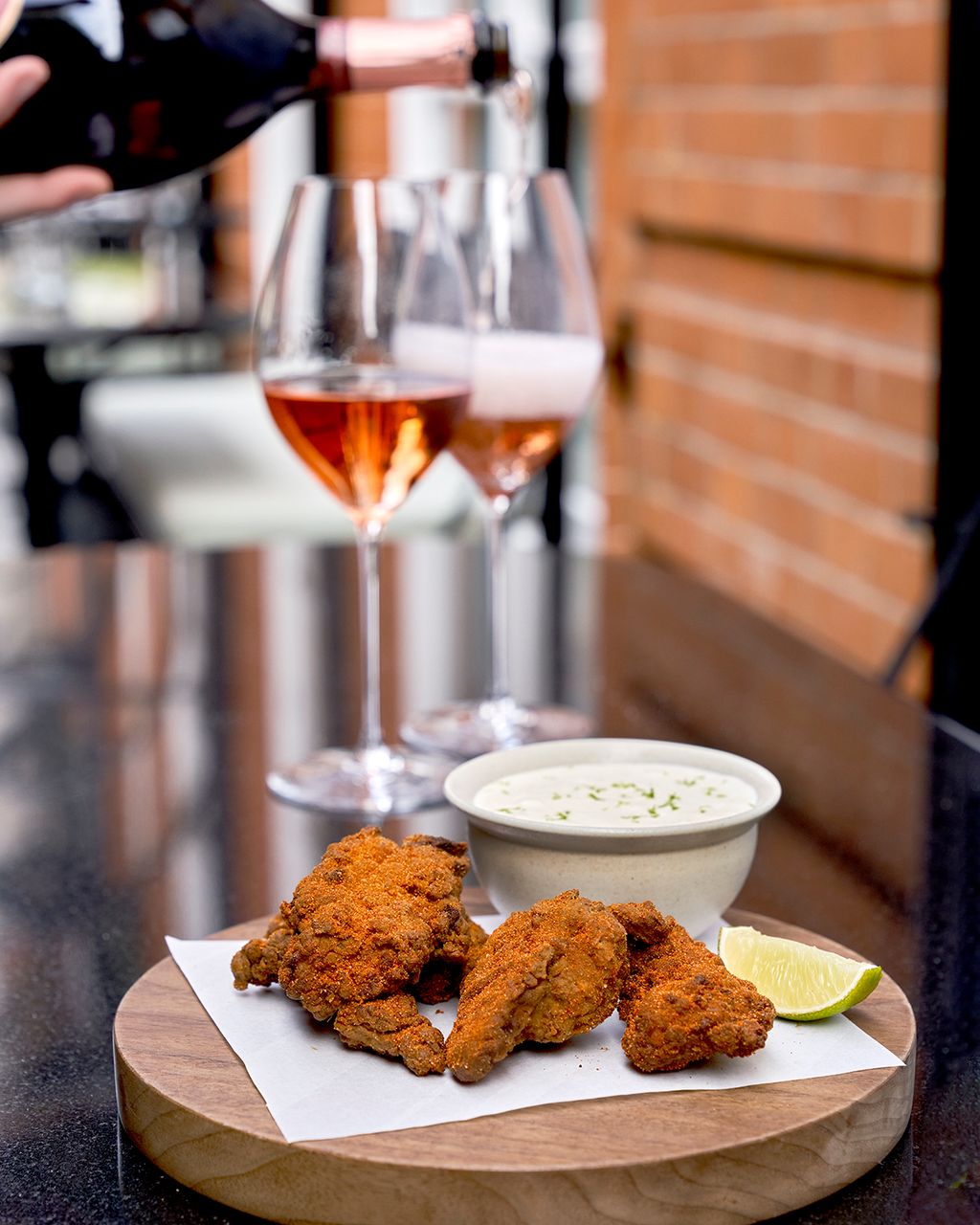 Image may contain Glass Food Food Presentation Fried Chicken and Person