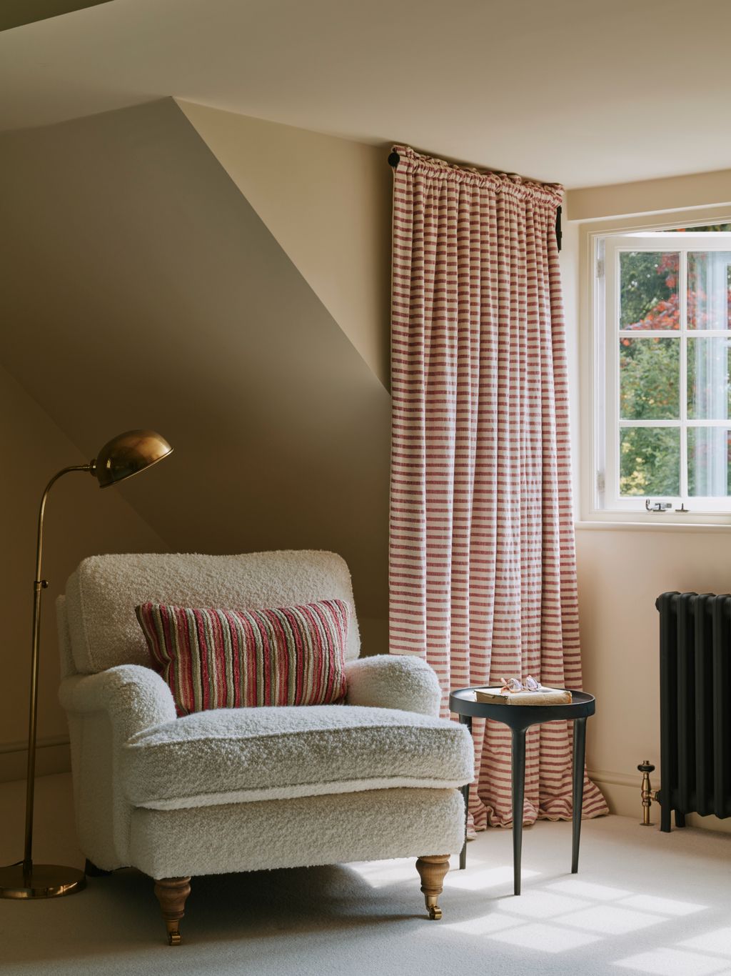 Image may contain Lamp Chair Furniture Home Decor Architecture Building Indoors Living Room and Room