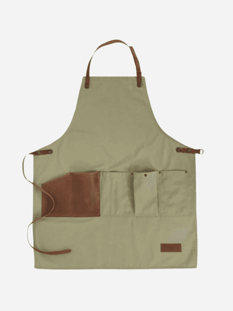 Image may contain: Accessories, Bag, Handbag, Apron, and Clothing