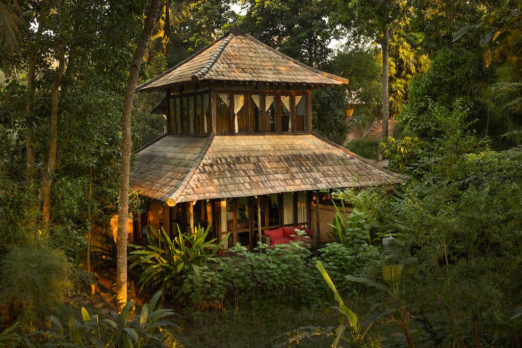 Image may contain Architecture Building Hotel Resort Cottage House Housing Couch and Furniture