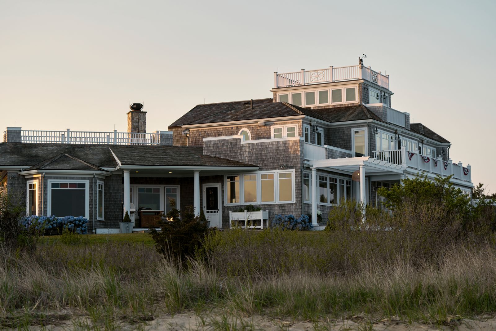Image may contain Plant Suburb Neighborhood Architecture Building Housing House and Grass