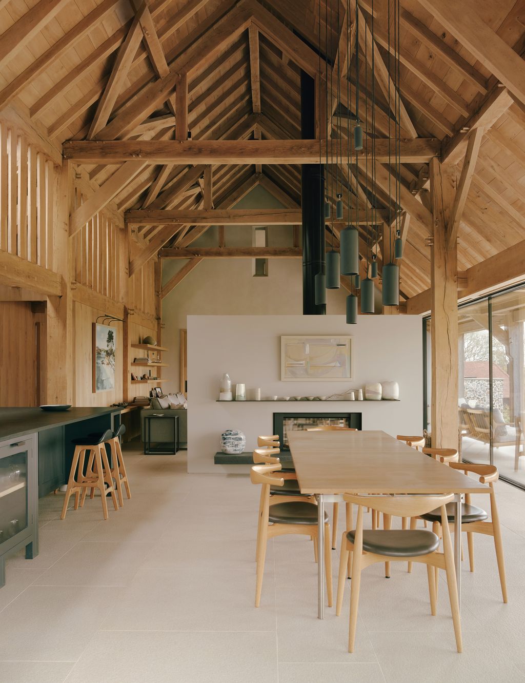 Image may contain Indoors Interior Design Dining Table Furniture Table Wood Architecture Building and Dining Room