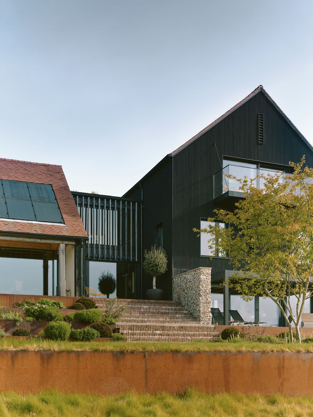 Image may contain Plant Architecture Building House Housing Villa Indoors Interior Design Outdoors and Shelter