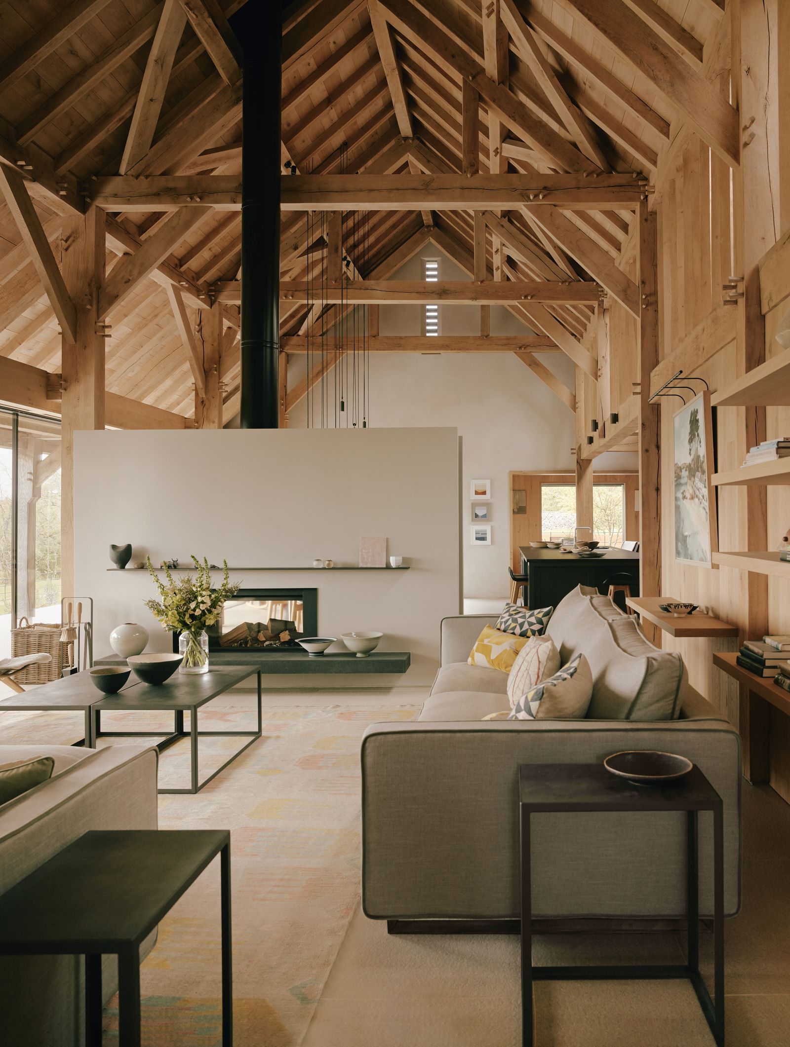 Image may contain Indoors Interior Design Coffee Table Furniture Table Couch Home Decor Wood Desk and Architecture