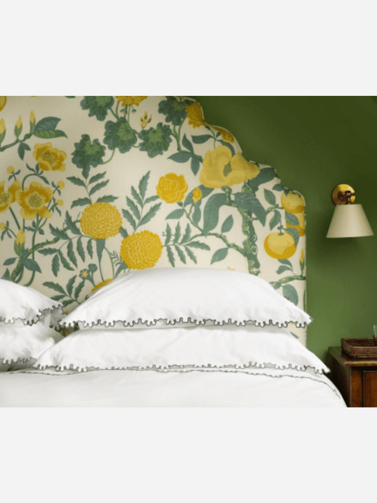 Image may contain: Cushion, Home Decor, Indoors, Interior Design, Lamp, Table Lamp, Pillow, and Furniture