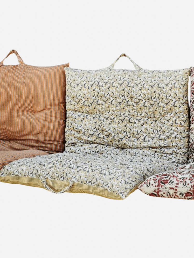 Image may contain: Cushion, Home Decor, Pillow, Couch, Furniture, Accessories, Bag, and Handbag