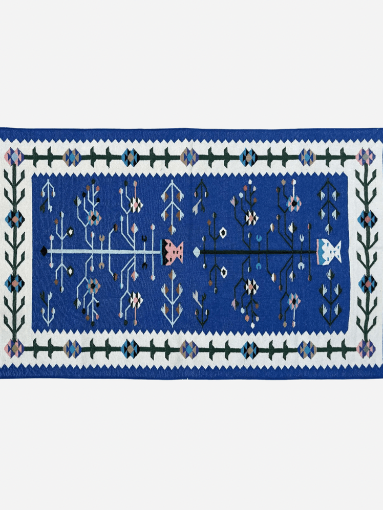 Image may contain: Home Decor, Rug, and Pattern