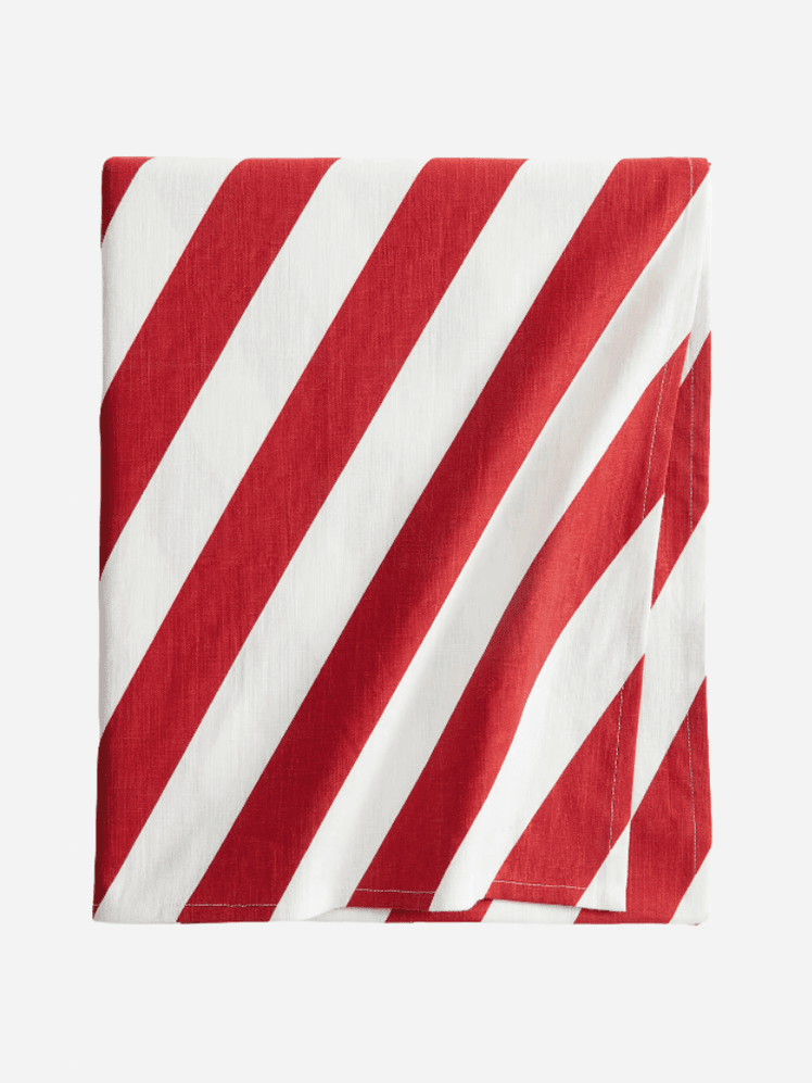 Image may contain: Flag, Accessories, Formal Wear, Tie, and Napkin