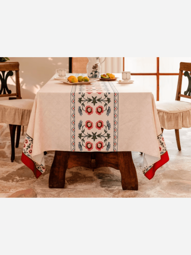 Image may contain: Tablecloth, Dining Table, Furniture, Table, Chair, Indoors, and Interior Design