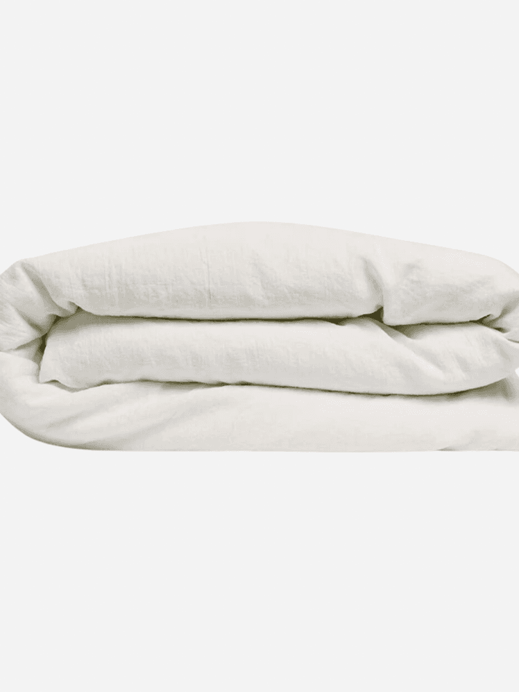 Image may contain: Cushion, Home Decor, Blanket, Linen, and Pillow