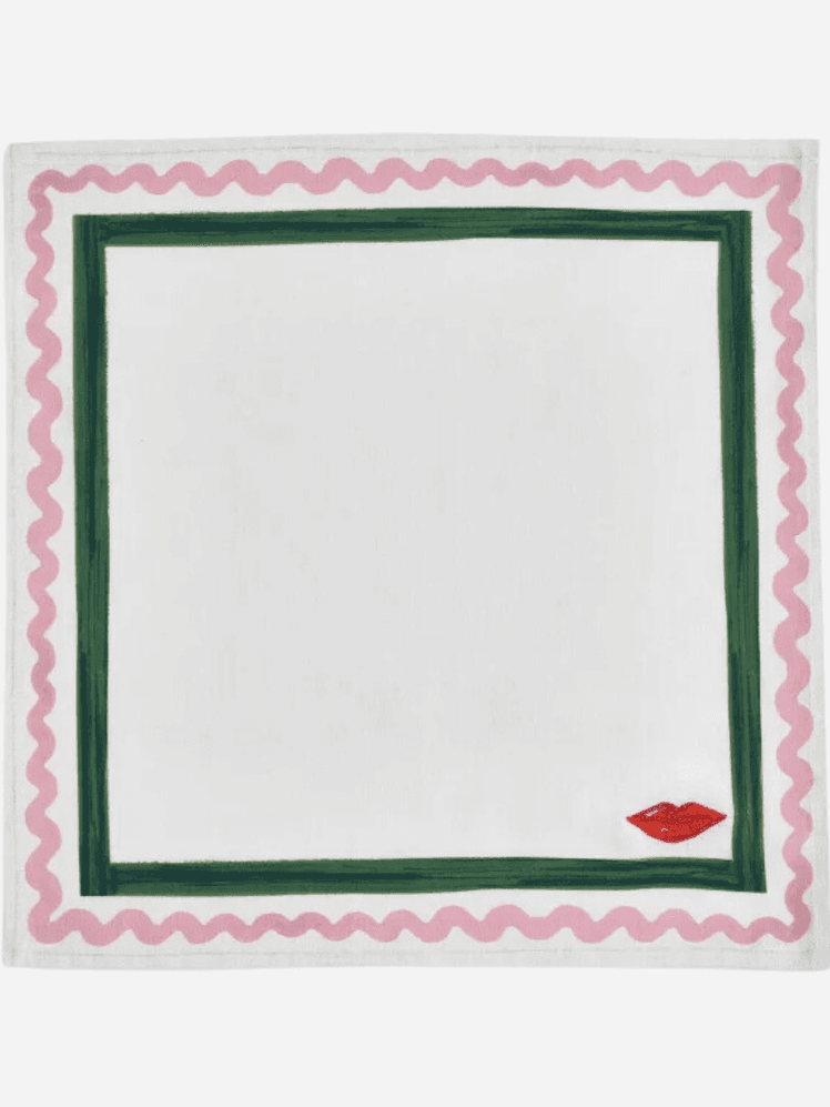 Image may contain: Home Decor, Rug, White Board, and Napkin