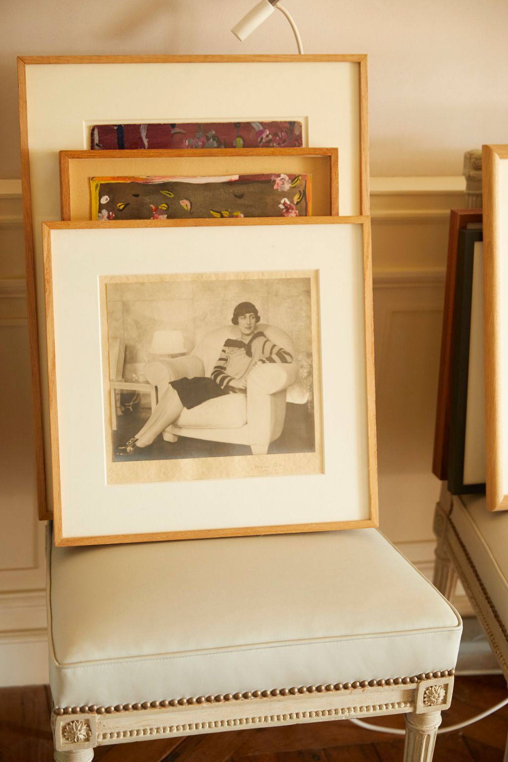 Image may contain Person Art Painting Lamp and Furniture