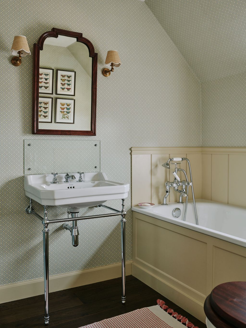 Image may contain Lamp Corner Sink Sink Faucet Bathing Art Painting Home Decor Rug Bathtub Person Tub and Desk